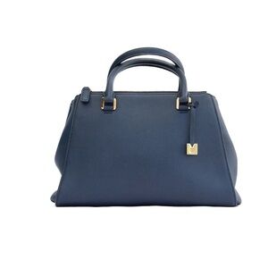 MCM Blue Leather Handbag. Multiple interior compartments. Excellent condition.